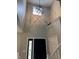 Grand entryway with high ceilings, modern light fixture, and black front door at 1378 Runningbrook Dr, Avon, IN 46123
