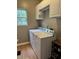 Functional laundry room with a washer, dryer, and cabinets for storage at 1378 Runningbrook Dr, Avon, IN 46123