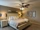Light and airy main bedroom features a ceiling fan, neutral color scheme, and carpeted floors at 1378 Runningbrook Dr, Avon, IN 46123
