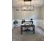 Bright office featuring a modern desk, chair, and light fixture in neutral color scheme at 1378 Runningbrook Dr, Avon, IN 46123