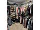 This walk-in closet features ample shelving and hanging space for organized storage at 1378 Runningbrook Dr, Avon, IN 46123