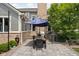 Outdoor patio with a dining table and grill perfect for outdoor gatherings at 13888 Smokey Ridge Dr, Carmel, IN 46033