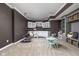 Open basement with playroom featuring white cabinetry, built-in storage, and play area perfect for children at 13888 Smokey Ridge Dr, Carmel, IN 46033