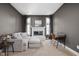 The sitting area features a fireplace, neutral colors, and plenty of natural light at 13888 Smokey Ridge Dr, Carmel, IN 46033