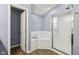A well lit bathroom features a glass shower and tub with tile surround at 13938 Charleswood Ct, Fishers, IN 46038