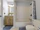 Bathroom with a vanity, mirror, shower/tub, and neutral accents at 141 S 9Th Ave, Beech Grove, IN 46107