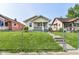 Charming single-Gathering home featuring a cozy front porch and well-maintained lawn at 1619 E Bradbury Ave, Indianapolis, IN 46203