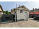 A detached, one-car garage with concrete floor for parking and storage in the backyard at 1619 E Bradbury Ave, Indianapolis, IN 46203