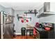 Functional kitchen featuring sleek black appliances and ample storage space at 1619 E Bradbury Ave, Indianapolis, IN 46203