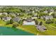 Beautiful aerial view of neighborhood pool and surrounding houses in a mature setting at 16802 Oak Manor Dr, Westfield, IN 46074