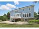 Spacious backyard with patio, deck, and lush landscaping perfect for outdoor living at 16802 Oak Manor Dr, Westfield, IN 46074