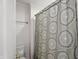 Bathroom featuring patterned shower curtain and standard toilet and accessories at 16802 Oak Manor Dr, Westfield, IN 46074