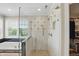 Bathroom featuring a glass shower and soaking tub with a window view at 16802 Oak Manor Dr, Westfield, IN 46074
