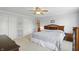 Bedroom with ceiling fan, neutral walls and carpet, and ample storage space at 16802 Oak Manor Dr, Westfield, IN 46074