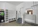 Well-organized garage entry with built-in shelving and ample storage space at 16802 Oak Manor Dr, Westfield, IN 46074