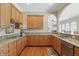 Bright and airy kitchen with granite countertops, stainless appliances, and ample cabinet space, perfect for cooking and entertaining at 16802 Oak Manor Dr, Westfield, IN 46074