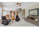 Spacious living room with comfortable seating, fireplace and large mirror adding depth, ideal for Gathering gatherings at 16802 Oak Manor Dr, Westfield, IN 46074