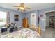 A bedroom featuring a bed, drumset and large closet at 1696 Woodfield Dr, Greenwood, IN 46143
