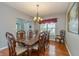Formal dining room with hardwood floors and ample seating at 1696 Woodfield Dr, Greenwood, IN 46143