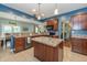 Well-equipped kitchen with a functional center island and ample counter space at 1696 Woodfield Dr, Greenwood, IN 46143