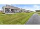 Lush green backyard with a paved walkway and covered patio areas great for outdoor entertaining at 17309 Graley Pl, Westfield, IN 46074