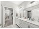 Bathroom with a double sink vanity, open doorway, and stylish finishes providing space for relaxation at 17309 Graley Pl, Westfield, IN 46074