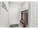 Welcoming entryway features a coat rack, bench, and storage baskets for a tidy and organized home entrance at 17309 Graley Pl, Westfield, IN 46074