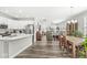 Bright, open-concept living spaces featuring a modern kitchen, dining area, and a spacious living room with ample natural light at 17309 Graley Pl, Westfield, IN 46074