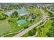 Community aerial view with multiple recreational facilities and a tranquil lake at 17357 Austrian Pine Way, Westfield, IN 46074