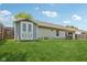 The home's backyard has a small shed for storage on a lawn at 17357 Austrian Pine Way, Westfield, IN 46074