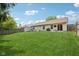 The backyard is enclosed by a wood fence and features a small storage shed at 17357 Austrian Pine Way, Westfield, IN 46074