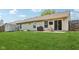 This backyard features a patio, grill, and plenty of green space at 17357 Austrian Pine Way, Westfield, IN 46074