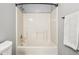 Bathroom features a bathtub and shower combination with towel rack adjacent to the shower at 17357 Austrian Pine Way, Westfield, IN 46074