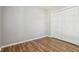 This bedroom has hardwood floors, neutral colored walls and a closet at 17357 Austrian Pine Way, Westfield, IN 46074