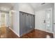 Bright entryway features attractive wainscoting detail and a welcoming front door at 17357 Austrian Pine Way, Westfield, IN 46074