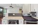 Close up of kitchen with granite countertops, stainless appliances, and modern backsplash at 17357 Austrian Pine Way, Westfield, IN 46074