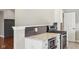 Kitchen area with granite countertops, stainless appliances, and a view of a door at 17357 Austrian Pine Way, Westfield, IN 46074