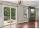 Living room featuring sliding glass doors to the backyard and an electric fireplace at 17357 Austrian Pine Way, Westfield, IN 46074