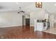 Open living space with wood floors, modern light fixtures, and vaulted ceilings at 17357 Austrian Pine Way, Westfield, IN 46074