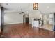 Open living space featuring wood floors, vaulted ceilings and modern kitchen appliances at 17357 Austrian Pine Way, Westfield, IN 46074