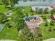 Aerial view of a community playground with swings, slides and lake view at 17357 Austrian Pine Way, Westfield, IN 46074