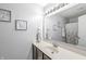Bathroom featuring a vanity, large mirror, and shower behind a curtain at 1829 Archbury Dr, Avon, IN 46123