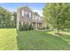 Charming two-story home with brick and siding exterior and a well-manicured lawn at 1829 Archbury Dr, Avon, IN 46123
