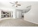 Bright living room featuring an open layout to the kitchen with stairs visible at 1829 Archbury Dr, Avon, IN 46123