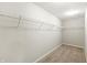 Spacious walk-in closet featuring carpet and white wire shelving at 1829 Archbury Dr, Avon, IN 46123