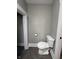 Bathroom with a toilet and tile flooring at 204 S Conger St, Saint Paul, IN 47272