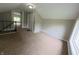 The bedroom features neutral walls, carpeting, a closet, and a window at 204 S Conger St, Saint Paul, IN 47272