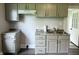 Close up of eat-in kitchen featuring granite countertop and gray cabinets at 204 S Conger St, Saint Paul, IN 47272