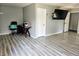 Large office area with hardwood floors, bright light, and adjacent to the main bedroom at 2041 Mckinley Ave, Columbus, IN 47201