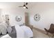 Stylish bedroom with ensuite bathroom featuring modern decor, a plush rug, and comfortable furnishings at 2051 Columbia Ave, Indianapolis, IN 46202